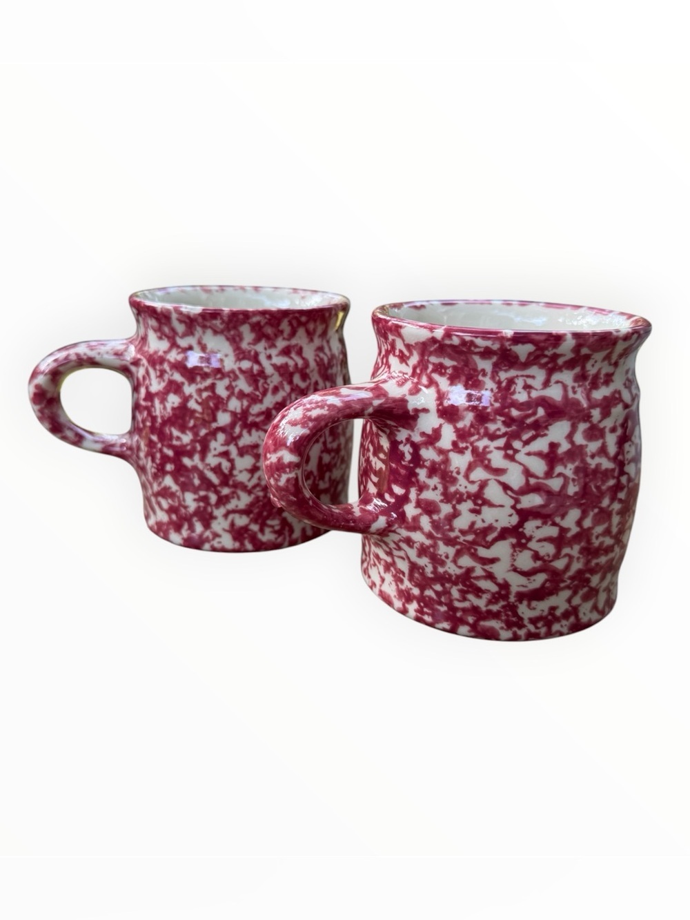 vintage Roseville Ohio pottery mug featuring a pink red spongeware design
